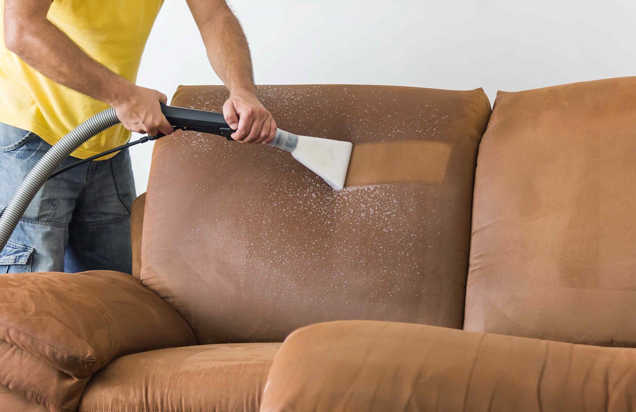 Cleaning a brown sofa